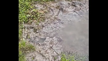 Bare feet playing in the mud