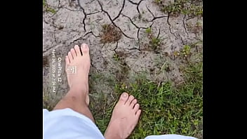 Bare feet playing in the mud