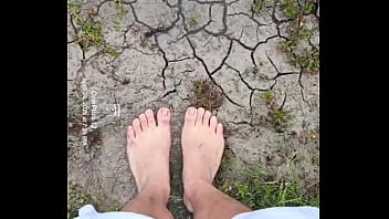 Bare feet playing in the mud