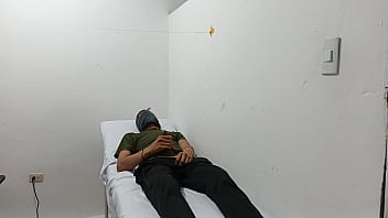 Kinky doctor masturbates his cock in the office