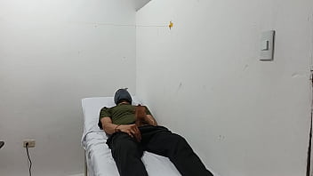 Kinky doctor masturbates his cock in the office