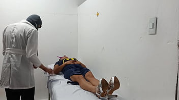 Kinky doctor masturbates his cock in the office