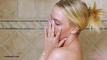 Iconic blonde vision enjoys a sensual bath