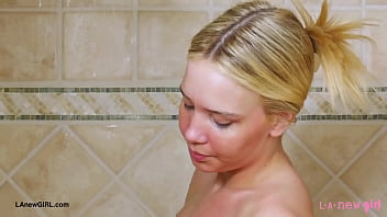 Iconic blonde vision enjoys a sensual bath