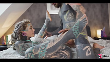 Tattooed girl deep anal pounding