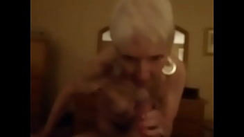 Horny bitch sucks two big cocks