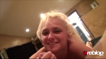 Hot blonde cock sucker plays with cum