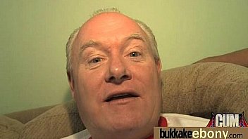 Ebony in a huge bukkake 24