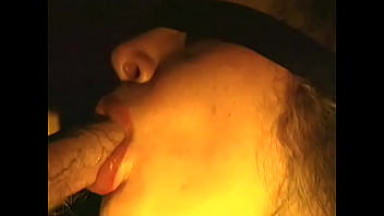 Jeanette blowing in the dark