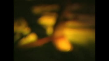 Jeanette blowing in the dark