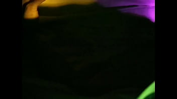 Jeanette blowing in the dark