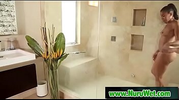 Busty asian sucking clients cock in nuru massage 18