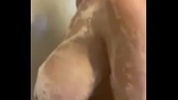 Bit titted animal takes a shower