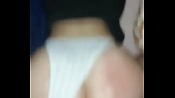 With the thong on one side and the cock all the way to the bottom