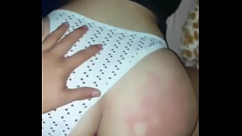 With the thong on one side and the cock all the way to the bottom