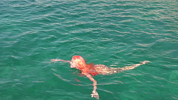 Blue water and a naked girl