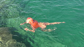 Blue water and a naked girl