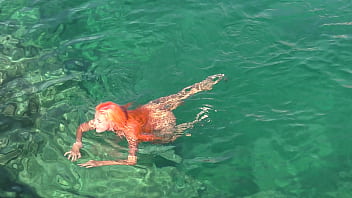 Blue water and a naked girl