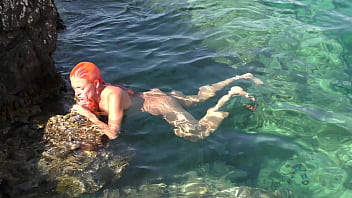 Blue water and a naked girl