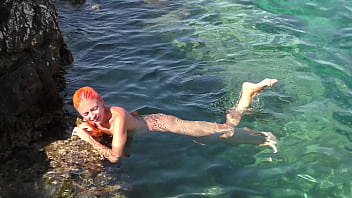 Blue water and a naked girl