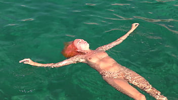 Blue water and a naked girl