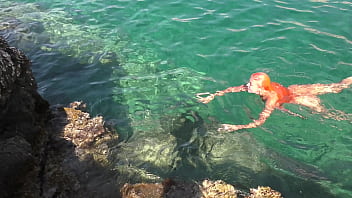 Blue water and a naked girl