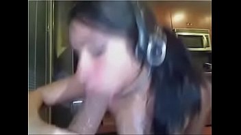 Latina webcam girl sucks dildo and takes fake cumshot