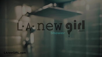 Bubbly blonde model enjoys a sensual bath