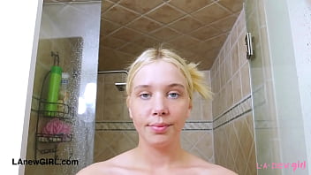 Bubbly blonde model enjoys a sensual bath