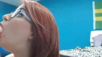 Short haired redhead cam girl gives an awesome head
