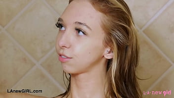 Pretty blonde model enjoys a sensual bath