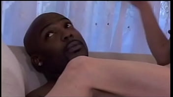 Curly haired babe gets an ebony and ivory fuck