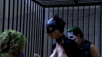 Katwoman jennifer dark prowls into a prison cage 3way
