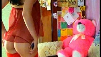 Sexy brunette in red linjerie fucking with a red dildo 1