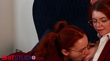 Two redhead uniformed students eat pussy and 69
