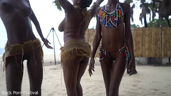 3 african tribe witches doing a dancing ritual for making rain