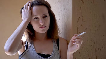 Brunette smoking tease with intense eye contact