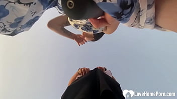 Sucking my cock outdoors while playing with a toy