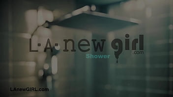 Shy attractive model enjoys a sensual bath