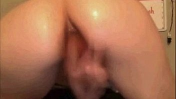 Brunette Putting A Dildo In The Ass thumbnail