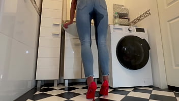 Desperate wetting my jeans and in my sexy red highheels and play with