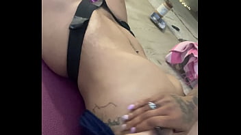 Strap on wearing ebony