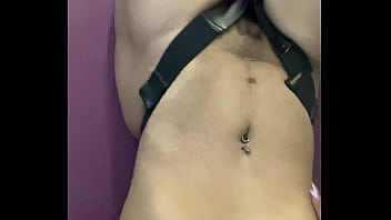 Strap on wearing ebony