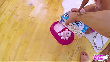 Fluffy slave pet on leash collared drinks milk from cock