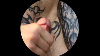 Bearded tattooed hunk blowing a load on the mountain