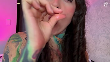 Girl with split tongue licks a lollipop and puts in ass