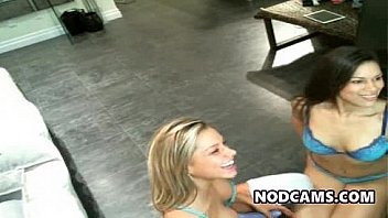 Hot chicks with strap on kissing sensualy