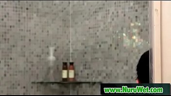 Busty asian sucking clients cock in nuru massage 22