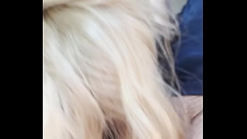 Blonde streetwalker takes a facial in public