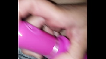 Fucking her pussy with her toy